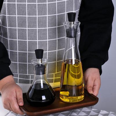 Chine bouteilles résistantes à la chaleur en verre de verrerie de 300ml 500ml pour l'huile de friture antirouille à vendre