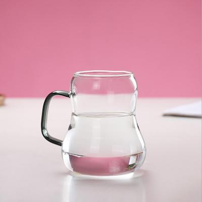 Chine La verrerie résistante à la chaleur épaissie Lidded place le poids léger de verre de bouilloire à vendre