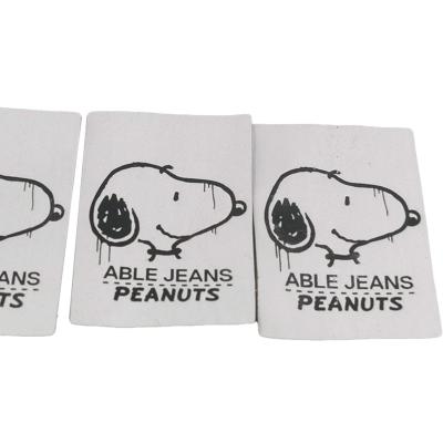 China Dog Pattern Jacron Label Cute Recyclable Cartoon Sticker Garment Labels en venta