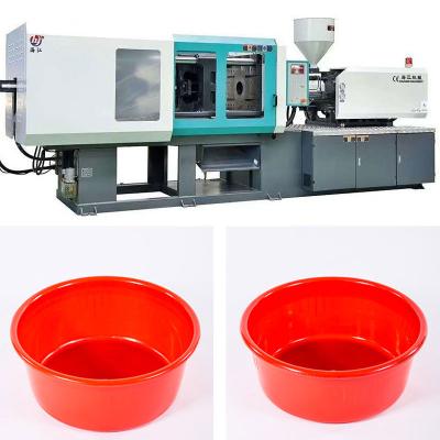 China Red Plastic Basin Injection Molding Machine	Wash Basin Mold Making Machine à venda
