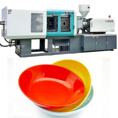 China Plastic round plate injection molding machine with high quality and output en venta
