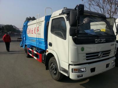 中国 アフリカの腕ロール ゴミ収集の屑コレクターのトラックへのDongfengの利き腕のごみ収集車190hp 4*2の輸出 販売のため