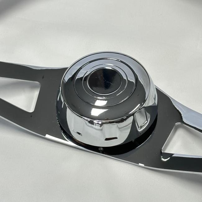 Truck wood steering wheel with horn button installed showing complete assembly