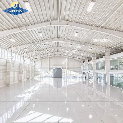 China QHHK Estructura prefabricada de acero Hangar/salón de exposiciones/centro comercial/estadio/edificio agrícola/taller/almacén en venta