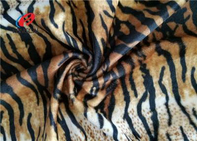 China Tela 100%, tela de veludo do poliéster de Velboa da listra do tigre animal da pele do falso da cópia à venda