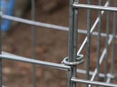 Two welded gabion panels are connected by the C ring.