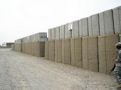 Gabion barriers are installed in the military site.