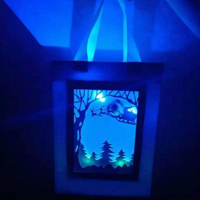 China super Cool darkness Luminous Paper Bags For Christmas And Easter Gifts for sale