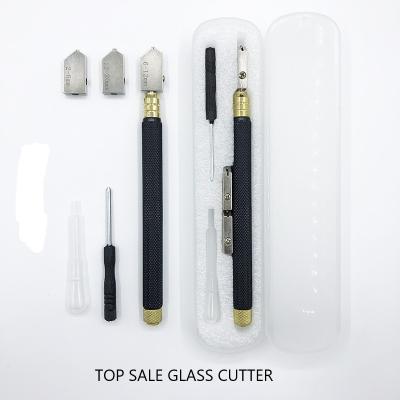 China Dispositivo de corte de vidrio eficiente con mango negro de metal perfecto para profesionales en venta