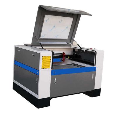 China 6090 1390 1610 60W 80W 100w máquina de grabado láser de CO2 para impresora de madera en venta