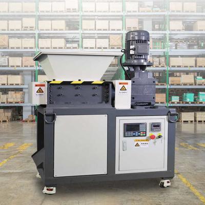 China Cajas industriales de plástico PET botella trituradora, máquina trituradora de doble eje en venta