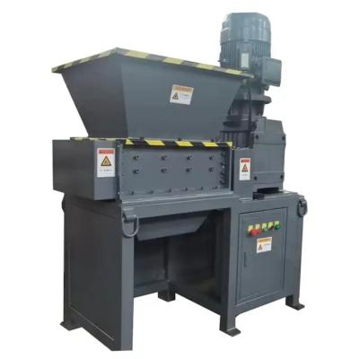 China Máquina de trituração de sucata de madeira de duplo eixo Máquina de trituração de espuma de resíduos à venda