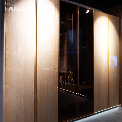 China Luxury Customized Wardrobe Closet UV Lacquer Gold Fitted Bedroom Wardrobe for sale