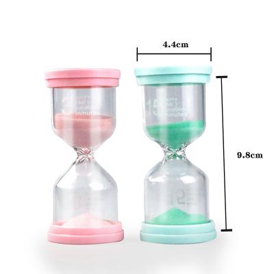 中国 卸売価格5分10の微細な砂時計によって着色される砂のガラス装飾的な砂時計のガラスsandtimersの砂時計 販売のため