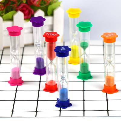 China Colorful Plastic Hourglass Timer Flower Shape Base Sand Timer For Kids Education for sale