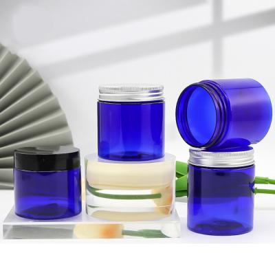 China 50ml Plastic PET Jar Empty Purple Cosmetic Face Cream Jar With White Lids for sale