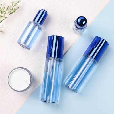 China Cosmetic PET Plastic Spray Bottle Cylinder Transparent Perfume Spray Bottle for sale