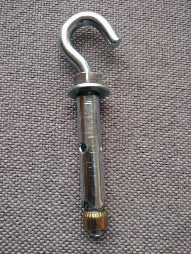 Multiple anchor bolts displayed showing consistent yellow zinc coating quality