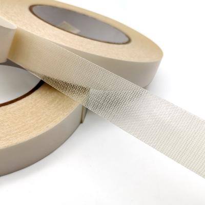 China Material echado a un lado doble adhesivo del paño de algodón de la cinta de la alfombra del derretimiento caliente para atar en venta