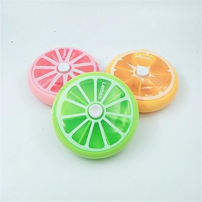China 7 days rotation pill box round pocket size for sale
