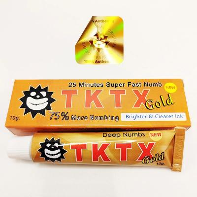China New Gold Tktx 75% Anaesthetic Painless Tattoo Numbing Cream No Pain Cream For Permanent Makeup for sale