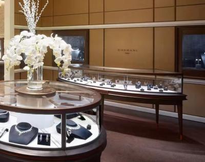 China Ronda de bronce de las vitrinas del escaparate de la joyería del vintage y gabinete de exhibición de centro de la tienda oval del reloj en venta