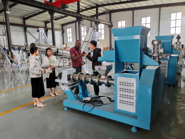 Customer inspecting production line