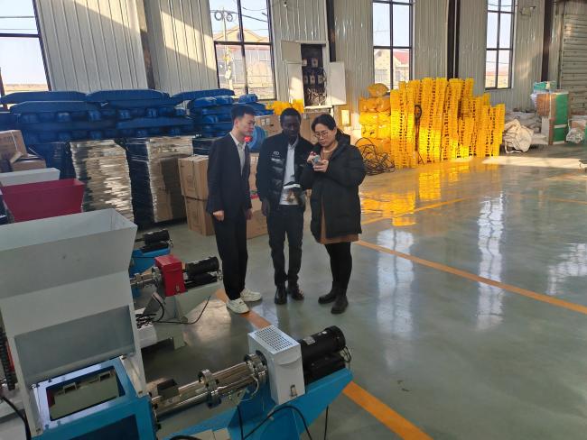 Customer inspecting machinery