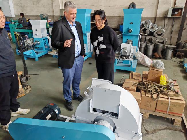 Customer inspecting machinery