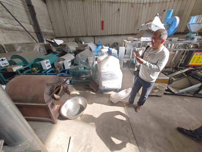 Customer inspecting our equipment