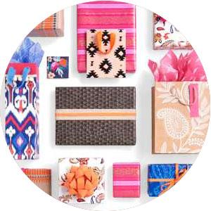 Colorful gift bags with tissue paper & gift boxes in pink, blue, purple, peach, flowers and stripes