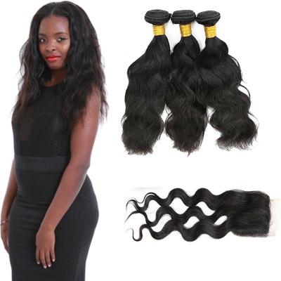 China 20 Inch Malaysian Curly Hair Bundles With Closure Natural Wave CE Certification for sale
