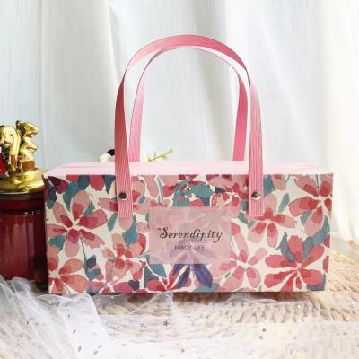 China Ribbon Bow Floral Kraft Paper Shopping Bag Clothes Footwear Packaging Box for sale