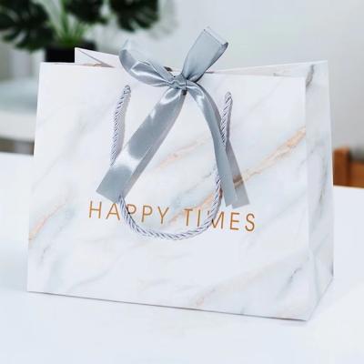 China Personalize LOGO Marble paper custom gift bag Paper Delivery Bags  with ribbon handle for sale