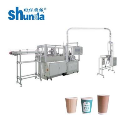China Máquina doble automática de la taza del papel de empapelar del sistema lubricante para el descenso altamente exacto del cuerpo de la taza en venta