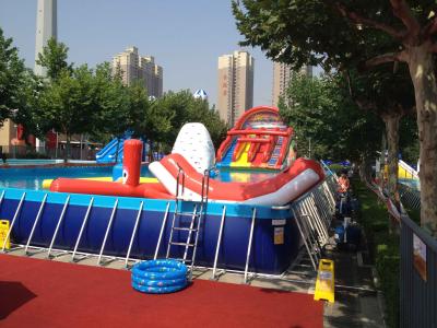 China Commercial Metal Frame Pool Red Water Slide Pool With Floating Toys for sale