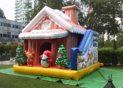 China Cuatomized 0.55mm PVC Merry Christmas Inflatable Santa Claus Bouncy Castle For Kids Play for sale