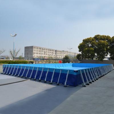 China Piscina móvil con marco de metal de lona de 0,9 mm sobre piscinas inflables de tierra al aire libre en venta