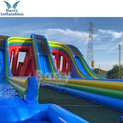 China Fire Proof Outdoor Backyard Inflatable Water Slides Games For Jumping for sale