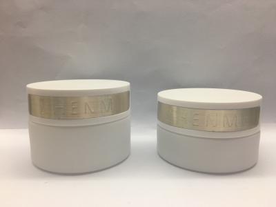 China OEM 30g 50g White Glass Cream Jars With Engrave Metal Plate Cream Bottles for sale