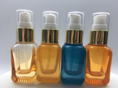 China SGS ISO MSDS Orange Blue 20ml Glass Pump Bottle For Lotion And Serum for sale