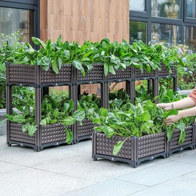 China OEM Self Watering Raised Plastic Garden Boxes Raised Garden Planter On Wheels for sale