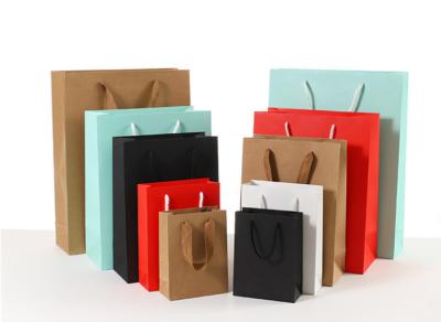 China Durable Coloured Paper Carrier Bags Matt / Glossy Lamination Surface Handling for sale