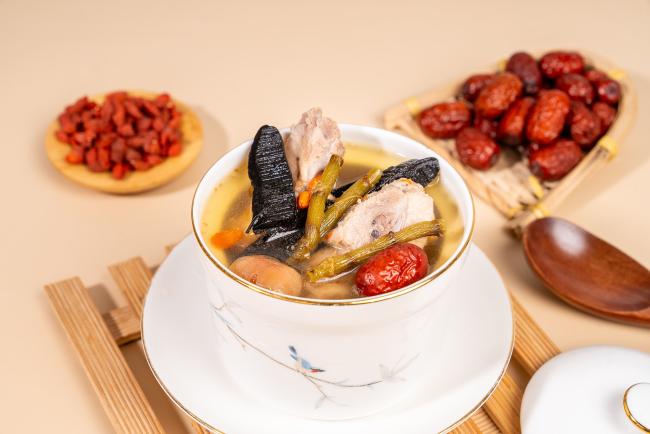Ready-to-Eat Reishi and Dendrobium Herbal Pork Bone Soup Served for Healthy Meal