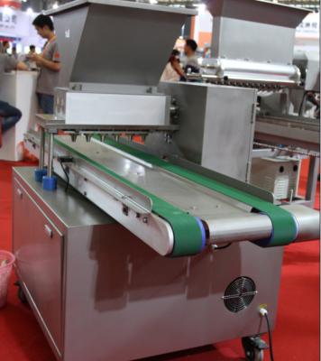 China 300 - 600 Trays/Hr Cake Depositor Machine Servo Motor With Delta PLC  Touch Screen for sale