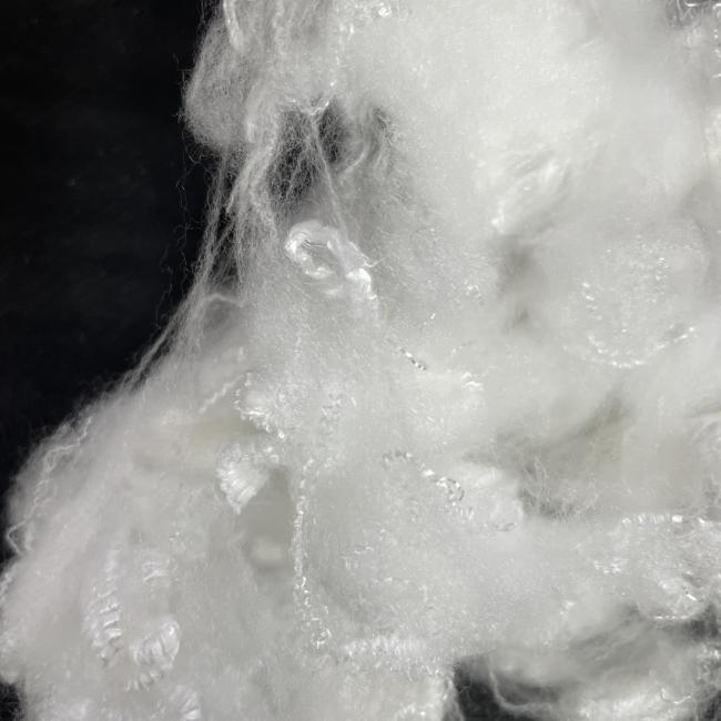 Close-up view of polyester cationic fiber demonstrating fiber structure and quality