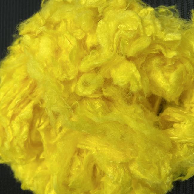 Close-up view of yellow viscose fiber texture
