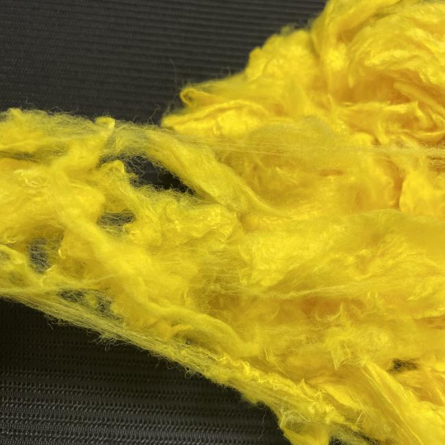 Finished textile products using yellow viscose fiber