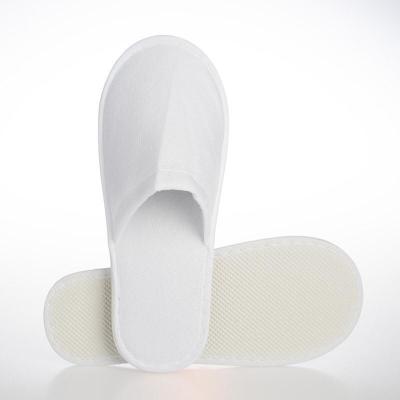 China Unisex Non woven Sole SPA Bathroom 100gsm Disposable Hotel Slippers for sale