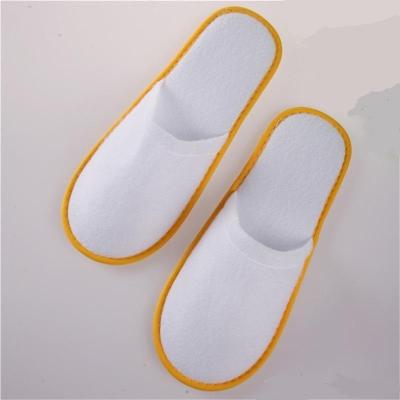 China Surgical Anti Slip Coral Fleece Disposable Hotel Slippers for sale